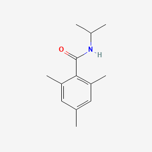 molecular formula C13H19NO B5273586 2,4,6-trimethyl-N-(propan-2-yl)benzamide 