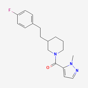 molecular formula C18H22FN3O B5281922 3-[2-(4-fluorophenyl)ethyl]-1-[(1-methyl-1H-pyrazol-5-yl)carbonyl]piperidine 