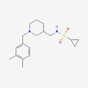 molecular formula C18H28N2O2S B5299073 N-{[1-(3,4-dimethylbenzyl)piperidin-3-yl]methyl}cyclopropanesulfonamide 