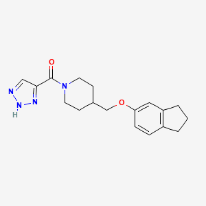 molecular formula C18H22N4O2 B5302437 4-[(2,3-dihydro-1H-inden-5-yloxy)methyl]-1-(1H-1,2,3-triazol-5-ylcarbonyl)piperidine 