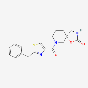 molecular formula C18H19N3O3S B5303672 7-[(2-benzyl-1,3-thiazol-4-yl)carbonyl]-1-oxa-3,7-diazaspiro[4.5]decan-2-one 