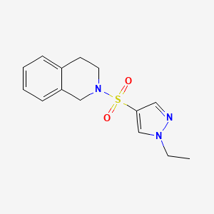 molecular formula C14H17N3O2S B5308867 2-[(1-ethyl-1H-pyrazol-4-yl)sulfonyl]-1,2,3,4-tetrahydroisoquinoline 