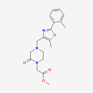 molecular formula C19H23N3O4 B5374625 methyl (4-{[5-methyl-2-(2-methylphenyl)-1,3-oxazol-4-yl]methyl}-2-oxopiperazin-1-yl)acetate 