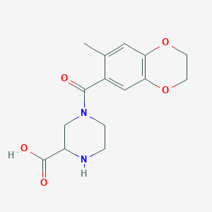 4-[(7-methyl-2,3-dihydro-1,4-benzodioxin-6-yl)carbonyl]piperazine-2-carboxylic acid