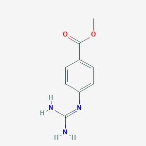 molecular formula C9H11N3O2 B054007 Methyl 4-[(diaminomethylidene)amino]benzoate CAS No. 122228-09-5