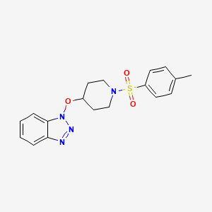 molecular formula C18H20N4O3S B5491707 1-({1-[(4-methylphenyl)sulfonyl]piperidin-4-yl}oxy)-1H-1,2,3-benzotriazole 