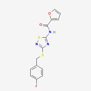 molecular formula C14H10FN3O2S2 B5502394 N-{3-[(4-fluorobenzyl)thio]-1,2,4-thiadiazol-5-yl}-2-furamide 