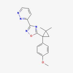 3-{5-[1-(4-methoxyphenyl)-2,2-dimethylcyclopropyl]-1,2,4-oxadiazol-3-yl}pyridazine