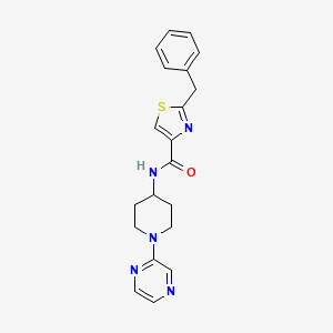 molecular formula C20H21N5OS B5504170 2-benzyl-N-[1-(2-pyrazinyl)-4-piperidinyl]-1,3-thiazole-4-carboxamide 