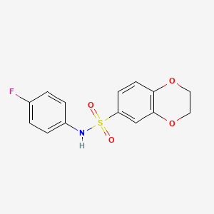 molecular formula C14H12FNO4S B5511797 N-(4-氟苯基)-2,3-二氢-1,4-苯二氧杂环-6-磺酰胺 