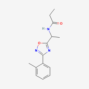 molecular formula C14H17N3O2 B5512269 N-{1-[3-(2-methylphenyl)-1,2,4-oxadiazol-5-yl]ethyl}propanamide 