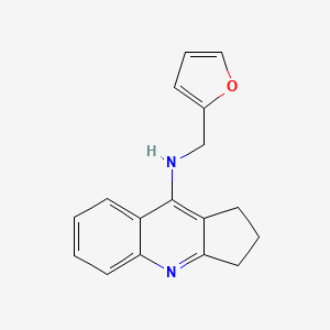 molecular formula C17H16N2O B5513765 N-(2-呋喃基甲基)-2,3-二氢-1H-环戊[b]喹啉-9-胺 