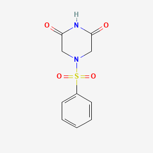 molecular formula C10H10N2O4S B5514058 4-(苯磺酰基)-2,6-哌嗪二酮 