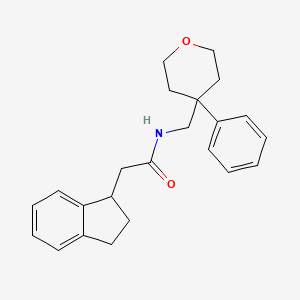 molecular formula C23H27NO2 B5520548 2-(2,3-dihydro-1H-inden-1-yl)-N-[(4-phenyltetrahydro-2H-pyran-4-yl)methyl]acetamide 
