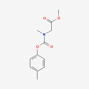 molecular formula C12H15NO4 B5521594 methyl N-methyl-N-[(4-methylphenoxy)carbonyl]glycinate 