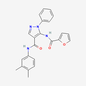 molecular formula C23H20N4O3 B5527299 N-(3,4-dimethylphenyl)-5-(2-furoylamino)-1-phenyl-1H-pyrazole-4-carboxamide 