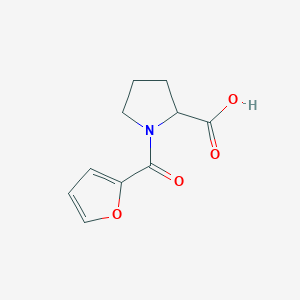 molecular formula C10H11NO4 B055284 1-(呋喃-2-羰基)吡咯烷-2-羧酸 CAS No. 117918-56-6