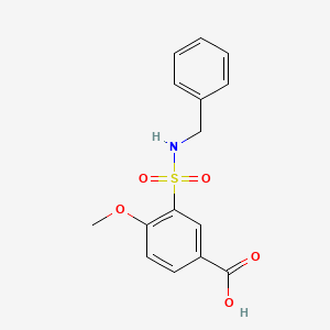 molecular formula C15H15NO5S B5533919 3-[(benzylamino)sulfonyl]-4-methoxybenzoic acid 