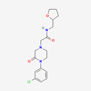 molecular formula C17H22ClN3O3 B5544960 2-[4-(3-chlorophenyl)-3-oxo-1-piperazinyl]-N-(tetrahydro-2-furanylmethyl)acetamide 