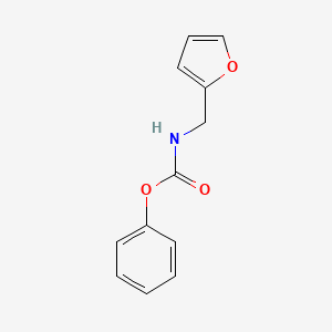 molecular formula C12H11NO3 B5554662 苯基（2-呋喃基甲基）氨基甲酸酯 