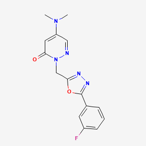 molecular formula C15H14FN5O2 B5555542 5-(dimethylamino)-2-{[5-(3-fluorophenyl)-1,3,4-oxadiazol-2-yl]methyl}pyridazin-3(2H)-one 