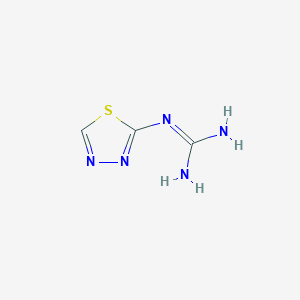 molecular formula C3H5N5S B055613 1-(1,3,4-Thiadiazol-2-yl)guanidine CAS No. 111393-94-3