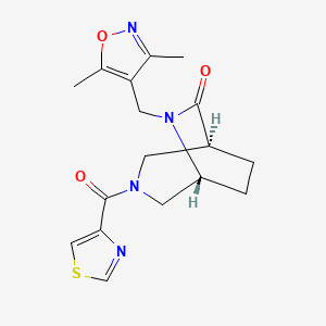 molecular formula C17H20N4O3S B5568420 (1S*,5R*)-6-[(3,5-dimethyl-4-isoxazolyl)methyl]-3-(1,3-thiazol-4-ylcarbonyl)-3,6-diazabicyclo[3.2.2]nonan-7-one 