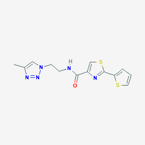 molecular formula C13H13N5OS2 B5570693 N-[2-(4-methyl-1H-1,2,3-triazol-1-yl)ethyl]-2-(2-thienyl)-1,3-thiazole-4-carboxamide 