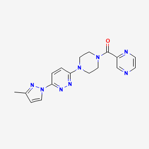 molecular formula C17H18N8O B5582722 3-(3-methyl-1H-pyrazol-1-yl)-6-[4-(2-pyrazinylcarbonyl)-1-piperazinyl]pyridazine 