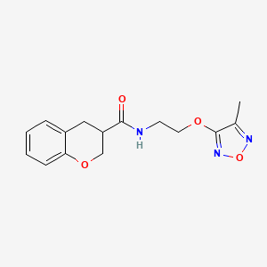 molecular formula C15H17N3O4 B5587601 N-{2-[(4-methyl-1,2,5-oxadiazol-3-yl)oxy]ethyl}chromane-3-carboxamide 