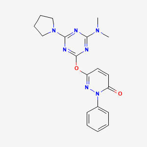 molecular formula C19H21N7O2 B5587660 6-{[4-(dimethylamino)-6-(1-pyrrolidinyl)-1,3,5-triazin-2-yl]oxy}-2-phenyl-3(2H)-pyridazinone 