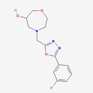 molecular formula C14H16FN3O3 B5587853 4-{[5-(3-氟苯基)-1,3,4-恶二唑-2-基]甲基}-1,4-恶杂环己醇 