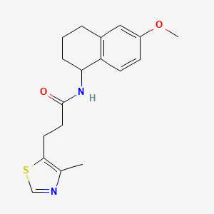 molecular formula C18H22N2O2S B5588459 N-(6-methoxy-1,2,3,4-tetrahydro-1-naphthalenyl)-3-(4-methyl-1,3-thiazol-5-yl)propanamide 