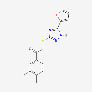 molecular formula C16H15N3O2S B5596407 1-(3,4-dimethylphenyl)-2-{[5-(2-furyl)-4H-1,2,4-triazol-3-yl]thio}ethanone 