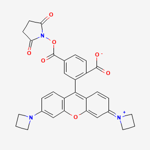molecular formula C31H25N3O7 B560340 2-(3,6-Di(azetidin-1-yl)xanthylium-9-yl)-4-(((2,5-dioxopyrrolidin-1-yl)oxy)carbonyl)benzoate CAS No. 1811539-32-8