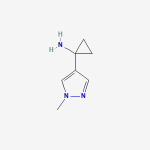 molecular formula C7H11N3 B561097 1-(1-Methyl-1H-pyrazol-4-yl)cyclopropanamine CAS No. 1338494-61-3