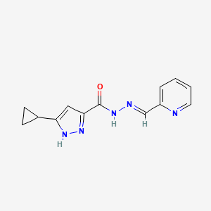 molecular formula C13H13N5O B5612498 3-cyclopropyl-N'-(2-pyridinylmethylene)-1H-pyrazole-5-carbohydrazide 