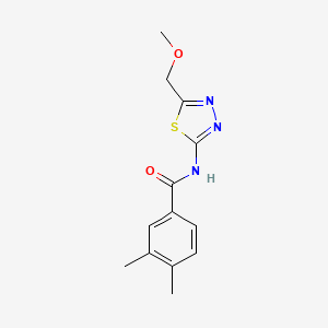 molecular formula C13H15N3O2S B5616936 N-[5-(methoxymethyl)-1,3,4-thiadiazol-2-yl]-3,4-dimethylbenzamide 