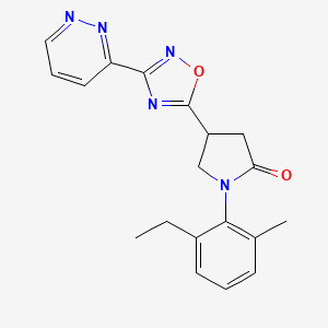 molecular formula C19H19N5O2 B5617972 1-(2-ethyl-6-methylphenyl)-4-[3-(3-pyridazinyl)-1,2,4-oxadiazol-5-yl]-2-pyrrolidinone 
