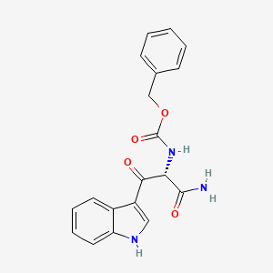 molecular formula C19H17N3O4 B561816 (L)-N-Benzyloxycarbonyl-|A-oxo-tryptophaneamide CAS No. 255371-72-3
