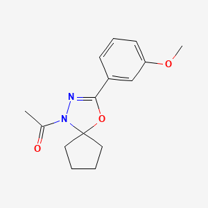 molecular formula C15H18N2O3 B5619186 1-acetyl-3-(3-methoxyphenyl)-4-oxa-1,2-diazaspiro[4.4]non-2-ene 