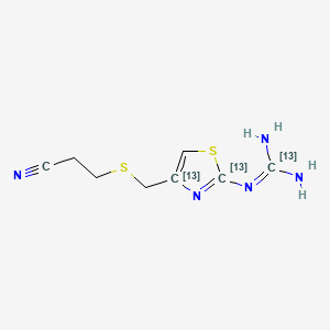 molecular formula C8H11N5S2 B562024 3-[[[2-[(二氨基亚甲基]氨基-4-噻唑基]硫]丙腈-13C3 CAS No. 1185040-73-6
