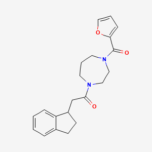 molecular formula C21H24N2O3 B5620735 1-(2,3-dihydro-1H-inden-1-ylacetyl)-4-(2-furoyl)-1,4-diazepane 