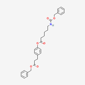 B562414 Benzyl 3-(4-(N-Benzyloxycarbonxyl-6-aminocaproyloxy)phenyl)propionate CAS No. 83592-08-9