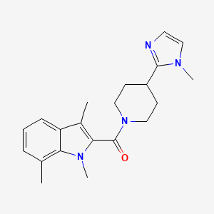 molecular formula C21H26N4O B5625509 1,3,7-trimethyl-2-{[4-(1-methyl-1H-imidazol-2-yl)-1-piperidinyl]carbonyl}-1H-indole 