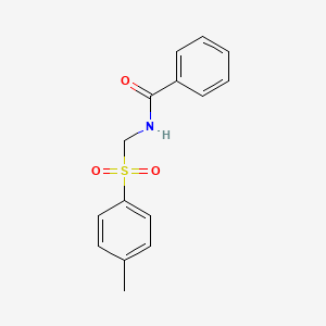 molecular formula C15H15NO3S B5625883 N-{[(4-methylphenyl)sulfonyl]methyl}benzamide 