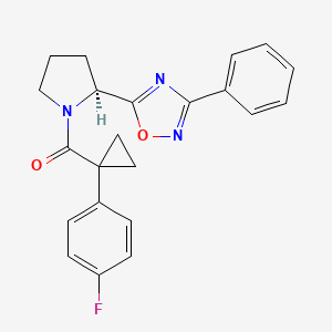 molecular formula C22H20FN3O2 B5628163 5-((2S)-1-{[1-(4-fluorophenyl)cyclopropyl]carbonyl}-2-pyrrolidinyl)-3-phenyl-1,2,4-oxadiazole 