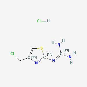 molecular formula C5H8Cl2N4S B563143 1-(4-Chloromethyl-2-thiazoyl)guanidine-13C3 Hydrochloride Salt CAS No. 1189443-23-9