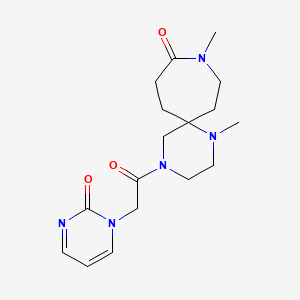 molecular formula C17H25N5O3 B5632353 1,9-dimethyl-4-[(2-oxo-1(2H)-pyrimidinyl)acetyl]-1,4,9-triazaspiro[5.6]dodecan-10-one 