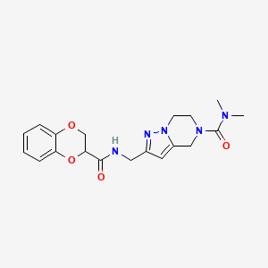 molecular formula C19H23N5O4 B5637730 2-{[(2,3-dihydro-1,4-benzodioxin-2-ylcarbonyl)amino]methyl}-N,N-dimethyl-6,7-dihydropyrazolo[1,5-a]pyrazine-5(4H)-carboxamide 